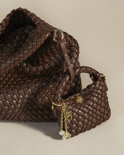 Dune London DeliberateXS 49 GBP chocolate brown micro bag charm www.dunelondon.com campaign shot