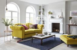Joules Windsor three-seater sofa in yellow velvet, available exclusively at DFS