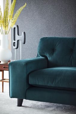 DFS Java four-seater velvet sofa in Dark Green