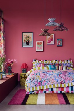 Sunset Stripe pillowcases, set of 2 £20 , Sunset Stripe king duvet cover set £85, Sunset Flowers king duvet cover set £85, Wiggle pleated shades £45 each & Flower wall art £18 each
