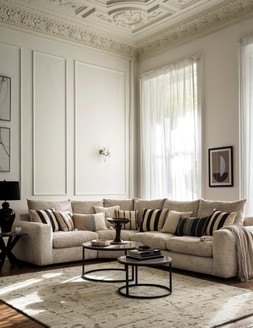 Furniture Village Boutique Pandora Small Corner Sofa in Plain Ivory, &pound;3,595 Yoyo Round Nest of Coffee Tables, &pound;399 Calvin Klein Sculptural Grey Rug, from &pound;329 Creed Lamp Table, &pound;319 Kalvin Table Lamp, &pound;199 Geometry 3 Framed Art, &pound;89