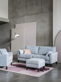 Furniture Village - Brondby 3 Seater, &pound;799, Brondby Footstool, &pound;219, Michelle Collins Abstract Art Rose and Crimson Rug, &pound;59