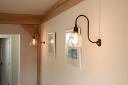 Swan neck wall lights with skinny ribbed Ledbury shades