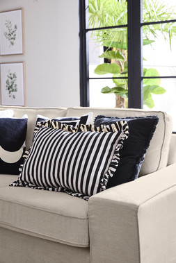 HOME SS26 // JAPANDI CALM // CUSHIONS // MONO STRIPE RUFFLE CUSHION £10 // VELVET FRINGE EDGE CUSHION BLACK £8 //