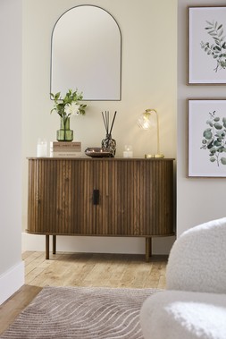 HOME SS26 // JAPANDI CALM // ARCH MIRROR £10 // FLORAL ARRANGEMENT IN HAMMERED VASE £12 // KRISTEN SIDEBOARD - DARK £100 //