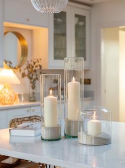 GLASS CYLINDER LANTERN WITH SAND H31CM D12CM £34.99, GLASS CYLINDER LANTERN WITH SAND H26CM D12CM £29.99, GLASS HURRICANE LANTERN WITH SAND H31CM D23CM £34.99