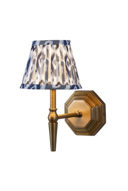 Single brass wall light with blue and grey pleated shade