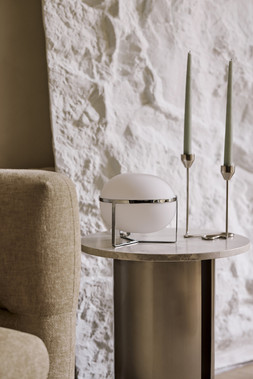 The Very Collection Swivel Accent Chair €454,Side Table €259,Candle Holders (Set of 2) €24.99,Table Lamp €62.99 at Very.ie